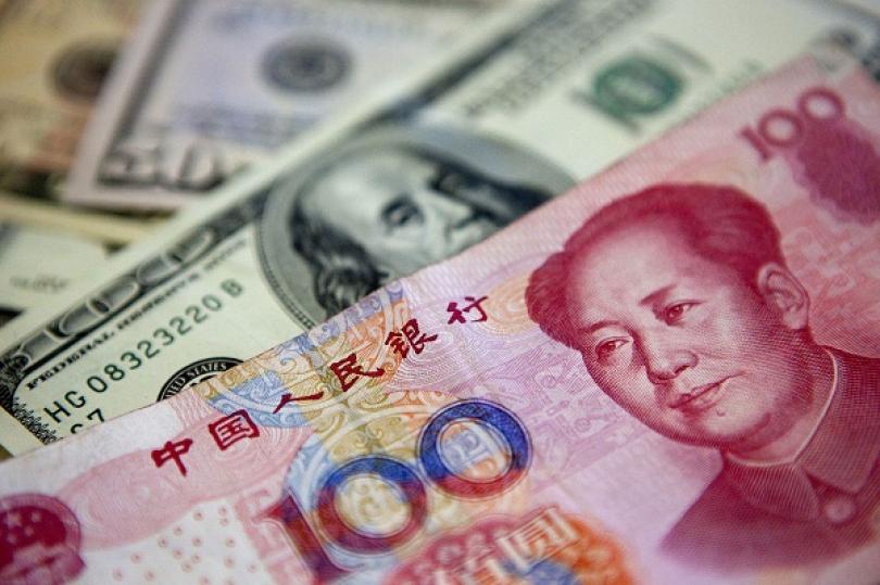 بنك الصين يحدد سعر صرف اليوان عند 6.4706