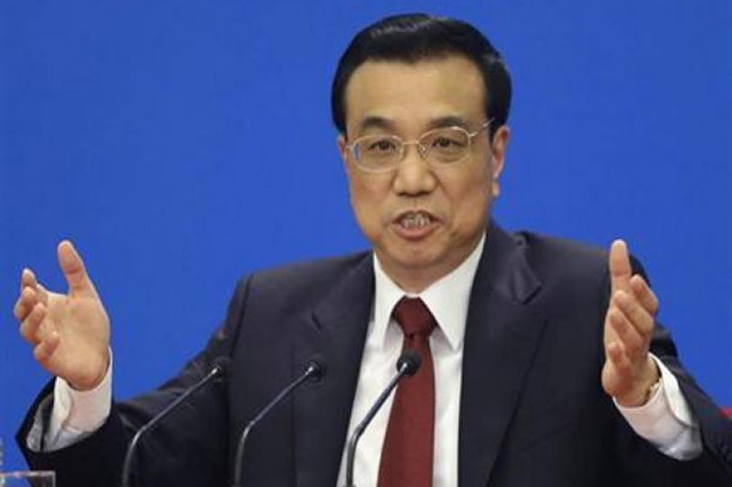 لي: لا ترغب الصين في التورط في حرب عملات