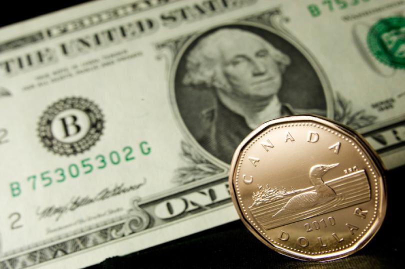 زوج الدولار كندي يحقق أعلي مستوياته خلال شهرين بالاستقرار أعلى 1.26