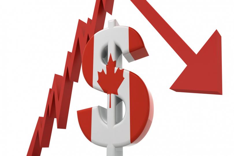 الدولار الكندي يسجل انخفاضات قوية أمام نظيره الأمريكي بعد قرارات بنك كندا